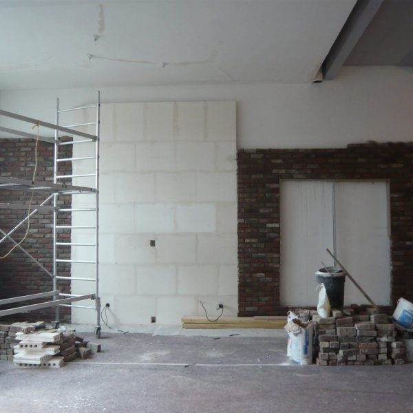 travaux sur un mur pour un loft